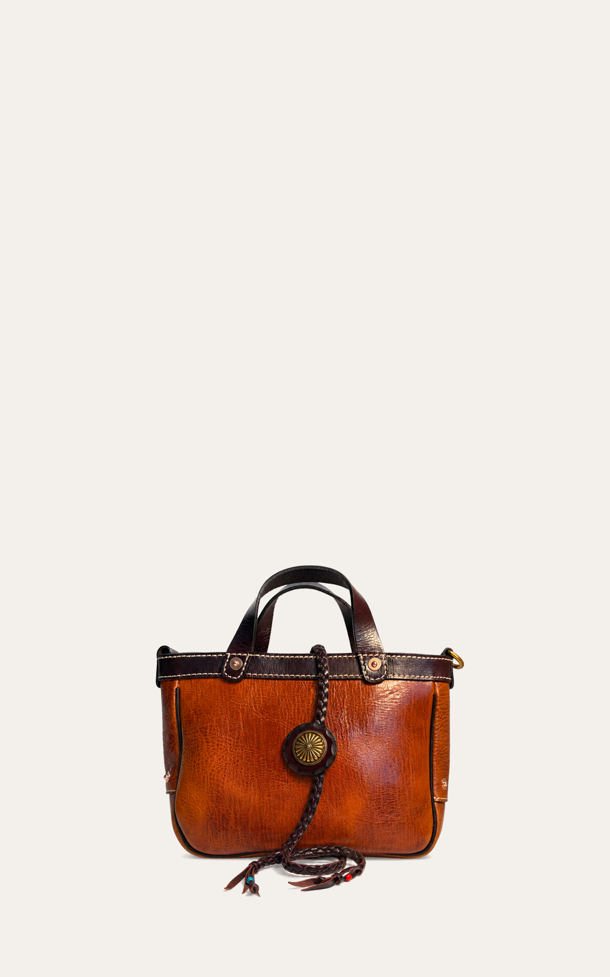 The Juniper full-grain leather convertible tote in cognac