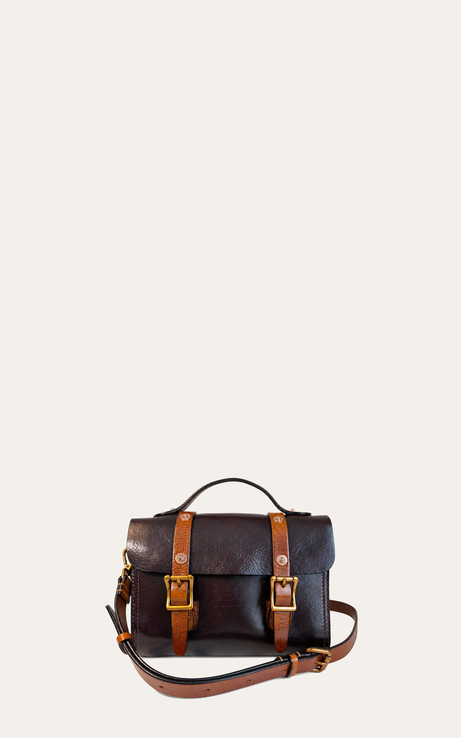The Cypress full-grain leather buckle satchel in Espresso and Cognac