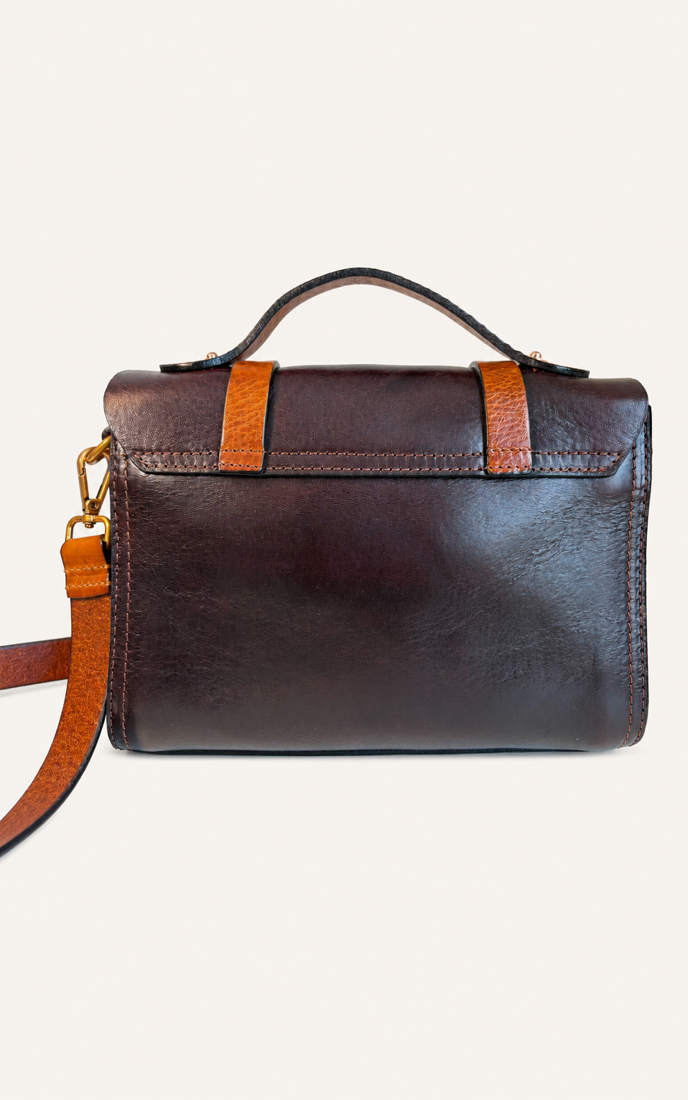 Deep espresso leather handbag with contrasting cognac straps