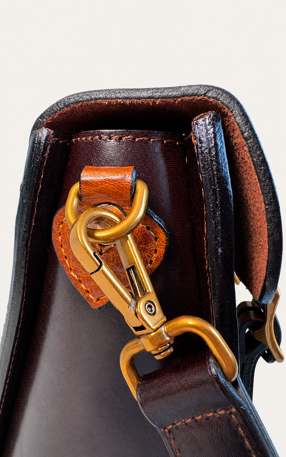 Full-grain leather texture and visible stitching detail